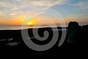 Sunset at Ales Stenar megalithic monument in Kaseberga, Scania, Sweden photo