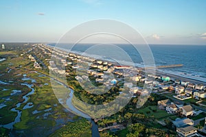 Sunset along the coast line at Oak Island NC aerial View