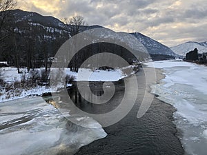 Sunset along the snowy Clark Fork River, a river runs through it