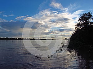 The sunset on Amazon river in Peru, South America