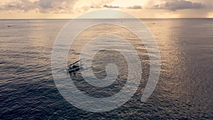 Sunset at Amed bay, Aerial view. Indonesia, Bali. Fishing boat in the ocean
