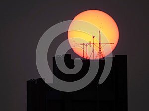 Sunset and antenna