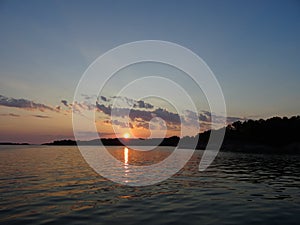 A sunset in archipelago by the gulf of Finland