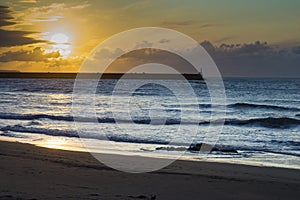 Sunset on Asturias beach. Clouds over the Cantabrian Sea photo