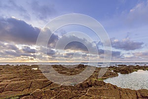 Sunset Atlantic Ocean view at Dar Bouazza rocky beach