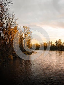 Sunset and autumn foliage along the Willamette River outside Eugene, Oregon