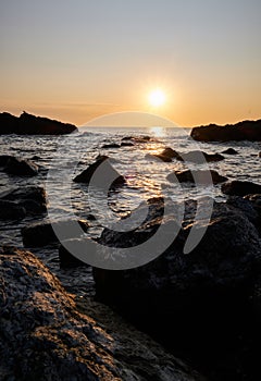 The sunset at the background in the atlantic ocean, Punta Ballena, Maldonado, Uruguay