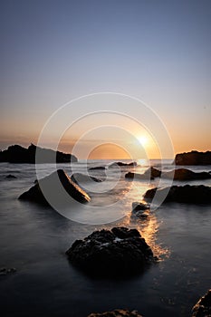 The sunset at the background in the atlantic ocean, Punta Ballena, Maldonado, Uruguay