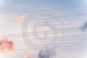 Sunset background. sky with soft and blur pastel colored clouds.  gradient cloud on the beach resort. nature. sunrise.  peaceful m