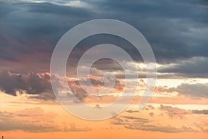 Sunset background. sky with soft and blur pastel colored clouds. sunshine through the gradient cloud on the beach resort. nature