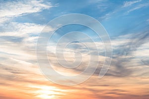 Sunset background. sky with soft and blur pastel colored clouds. sunshine through the gradient cloud on the beach resort. nature