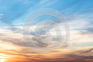 Sunset background. sky with soft and blur pastel colored clouds. sunshine through the gradient cloud on the beach resort. nature