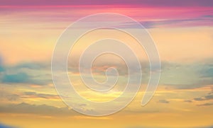 Sunset background,sun on blue  sky ,sunlight at sea, fluffy clouds on skyline ,nature pink yellow blue pastel color   nature