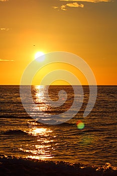 Sunset at the baltic sea beach of ustronie morskie, poland