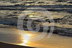 Sunset at the baltic sea beach of ustronie morskie, poland