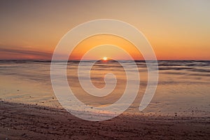 Sunset on Baltic sea shore