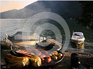 Sunset barbecue with boats