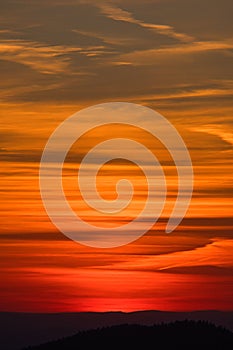 Sunset in the Bavarian Forest. Orange-red sky