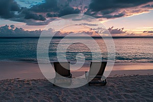 Sunset Beach Chairs. Two beach chairs facing the ocean