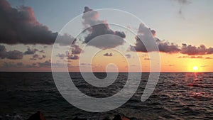 Sunset on the beach, incredible colors and clouds, panoramic. Adriatic Sea, Italy, Amantea Calabria.