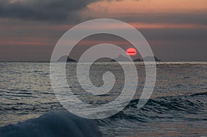 Sunset on the beach of Ipanema photo