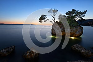 Sunset at beach with Kamen Brela (Brela Stone), Brela, Adriatic