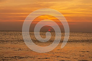 Sunset on the beach at Kanyakumari Tamil Naidu India photo