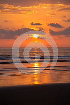 Sunset on the beach of Matapalo in Costa Rica photo