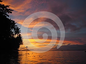 Sunset in a beach of Mentawai islands, Indonesia photo