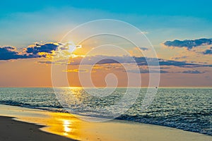 Sunset on the beach on north side of the Provincelands Cape Cod, Atlantic ocean view MA US.