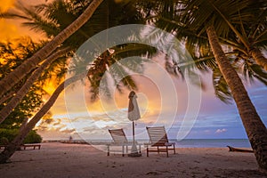 Sunset beach resort. Relaxing and romantic sunset beach scene for background and summer vacation and holiday concept
