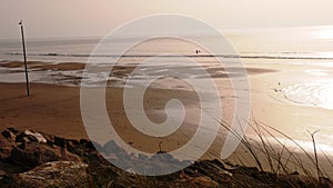 Sunset on the beach of Sainte CÃ©cile on the banks of the English Channel on the CÃ´te d\'Opale photo