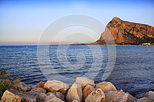 Sunset on beach of San Vito Lo Capo, Sicily with view on Mount Monaco