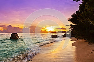 Sunset on beach Source D'Argent at Seychelles