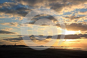 Sunset on the beach of St Malo Brittany France.