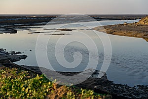 Sunset on the beach / sunset over the river