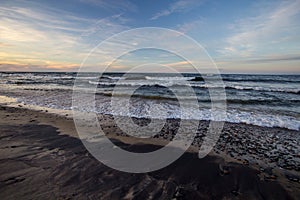 Sunset Beach With Waves On Lake Superior In Michigan