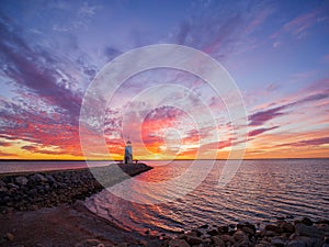 Sunset beautiful afterglow over the lighthouse of Lake Hefner