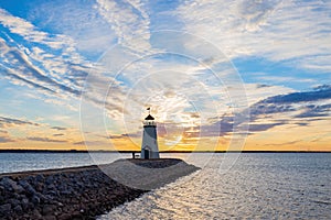 Sunset beautiful afterglow over the lighthouse of Lake Hefner