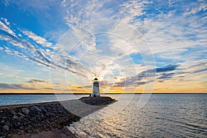 Sunset beautiful afterglow over the lighthouse of Lake Hefner