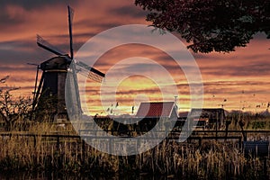 Windmill sunrise silhouette