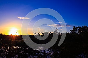 Sunset beautiful in sky dark color and silhouette tree colorfulsunset beautiful in sky dark color and silhouette tree colorful lan photo