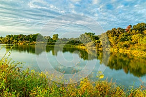 Sunset with beautiful skyline over Ed Zorinsky lake Omaha Nebraska