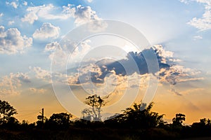 Sunset with beautiful sunlight and cloud, blue sky in the evening