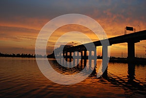 Sunset behind bridge