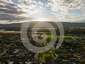 Sunset behind the mountains of Te Puke city. Bay of Plenty, New Zealand