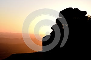 A sunset behind rocks in the Valley of Desolation