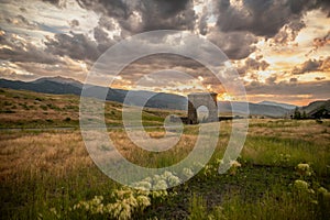 Sunset Behind Roosevelt Arch In Gardiner Montana