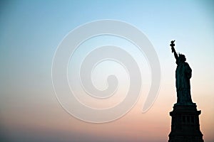 Liberty statue sunset in New York