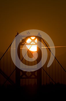 Sunset behind Tacoma Narrows Bridge photo